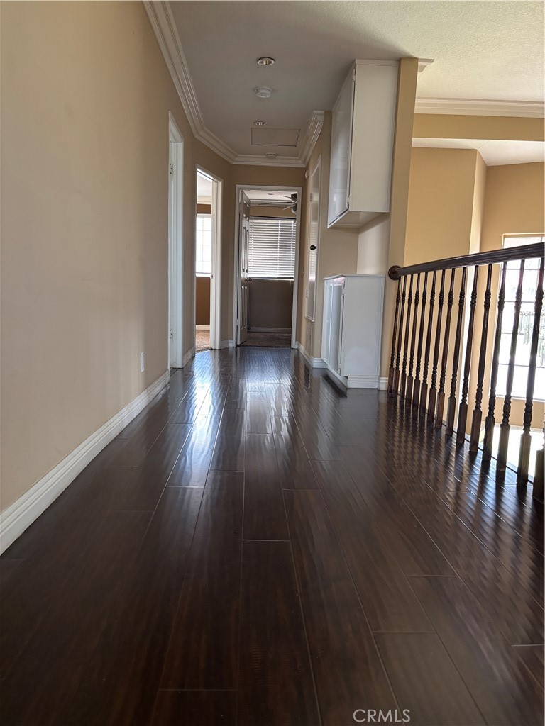 17092 Whispering Brook Way Riverside, CA 92503 - Photo 43 of 74 wooden floor in an empty room with a window