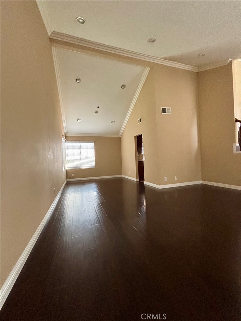 17092 Whispering Brook Way Riverside, CA 92503 - Photo 7 of 74 a view of empty room with wooden floor