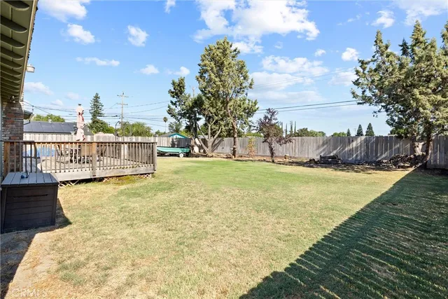 a front view of a house with a garden and porch