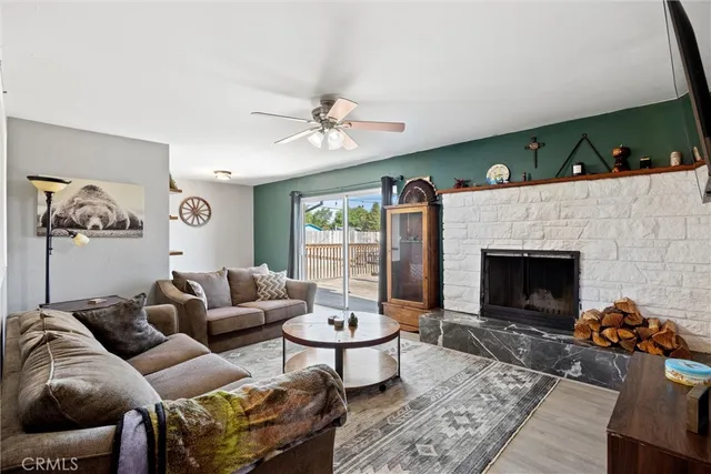 a view of livingroom with furniture and workspace