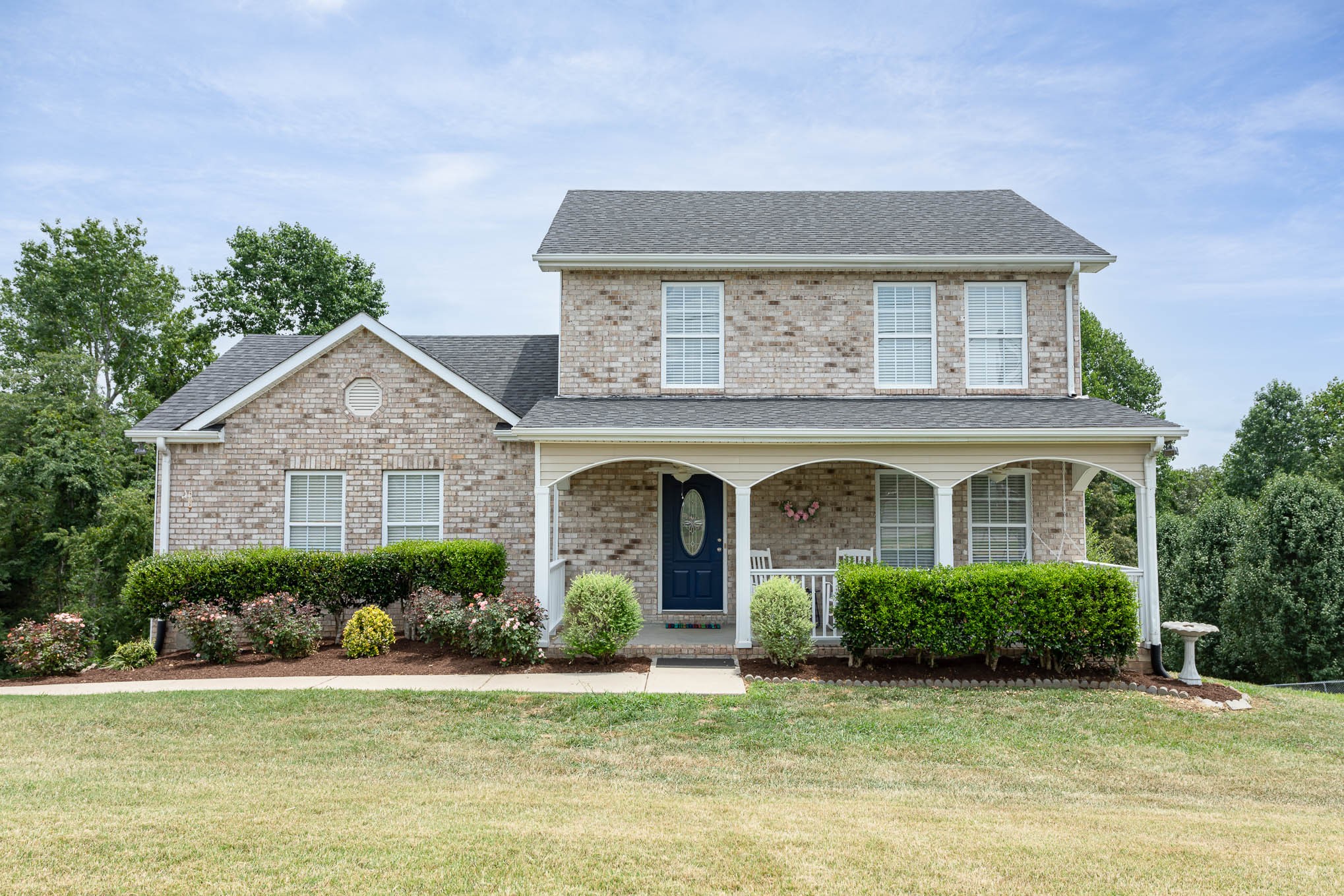 817 Blakemore Road Dickson, TN 37055 - Photo 1 of 30 a front view of a house with a yard and garage