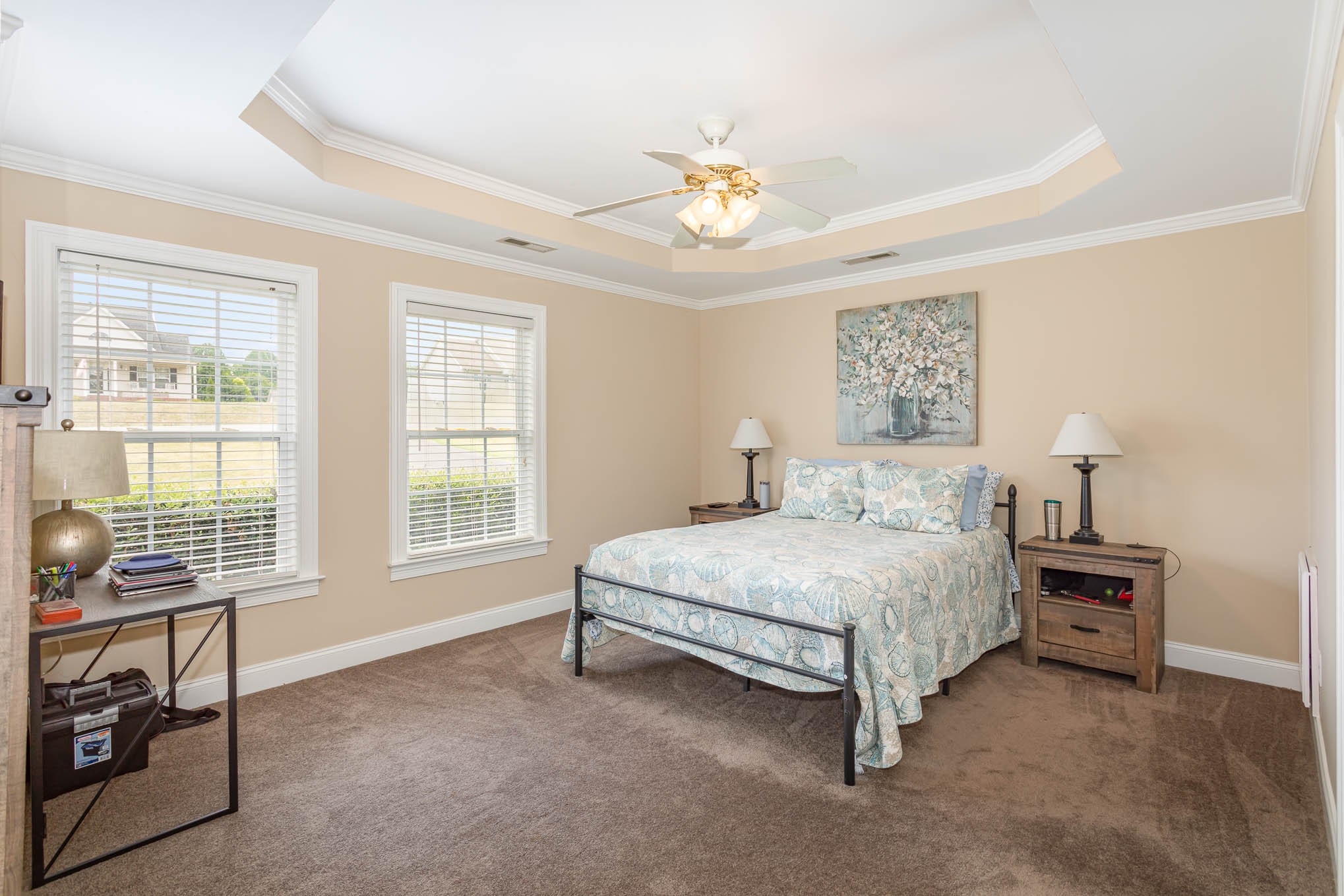 817 Blakemore Road Dickson, TN 37055 - Photo 13 of 30 a spacious bedroom with a bed and a chandelier