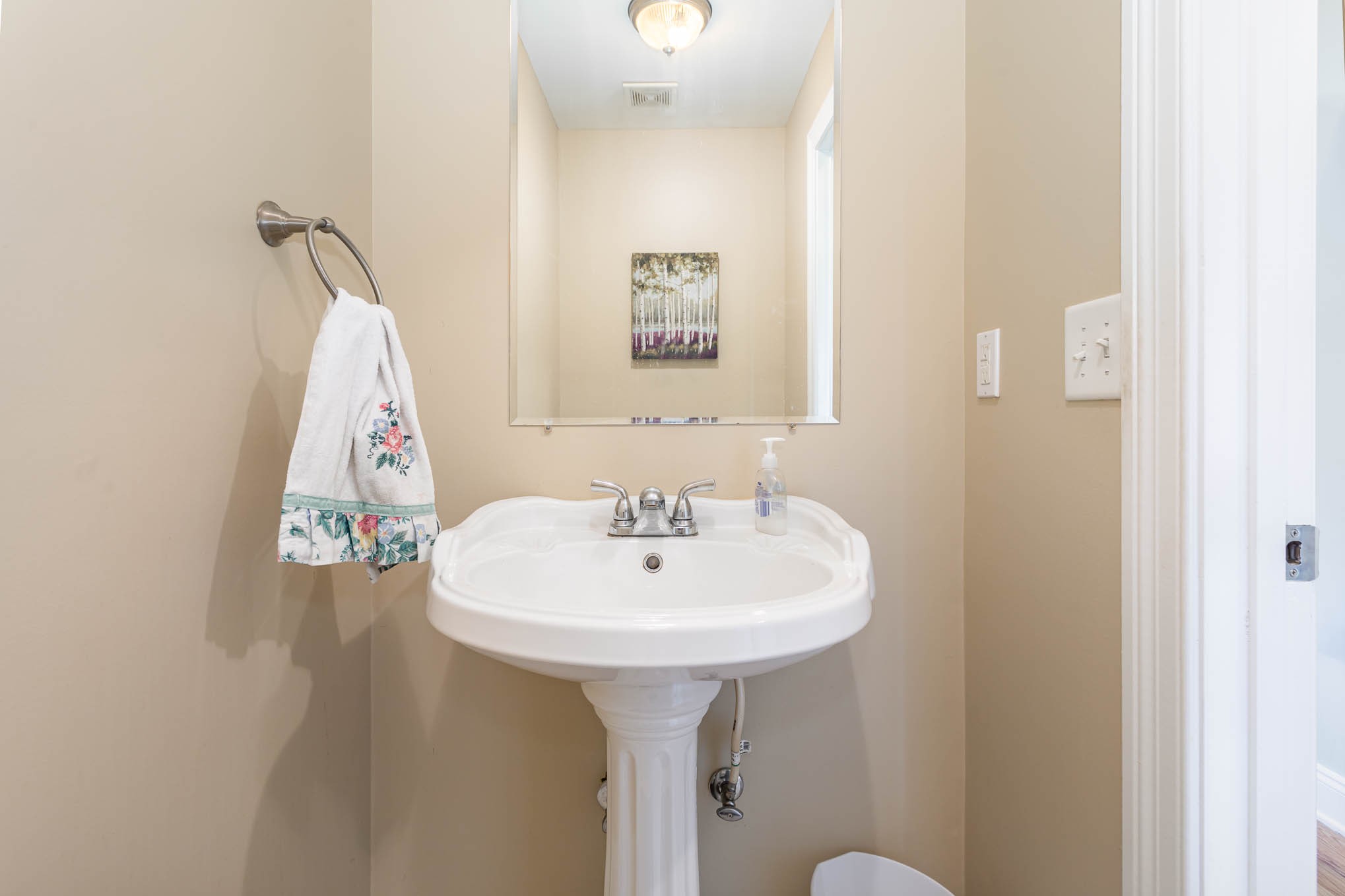 817 Blakemore Road Dickson, TN 37055 - Photo 18 of 30 a bathroom with a sink and a mirror