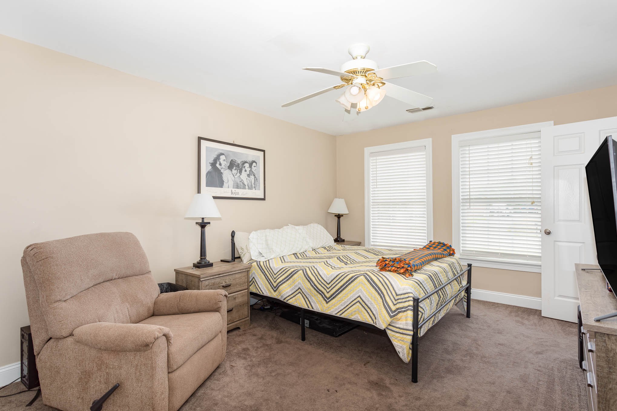 817 Blakemore Road Dickson, TN 37055 - Photo 23 of 30 a bed room with a bed and a couch