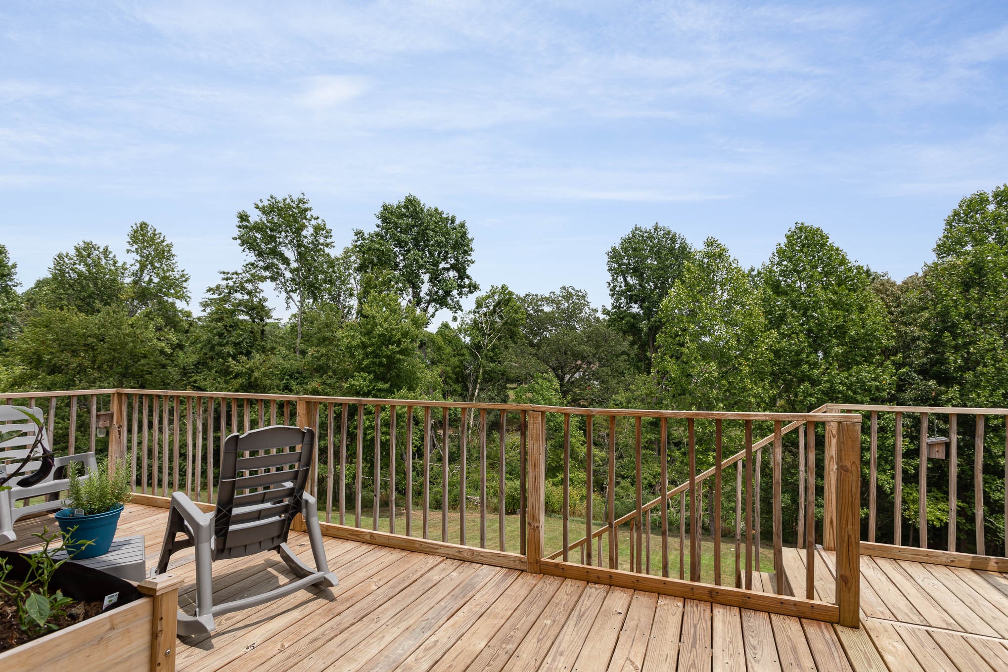 817 Blakemore Road Dickson, TN 37055 - Photo 27 of 30 a view of a deck with two chair and wooden floor
