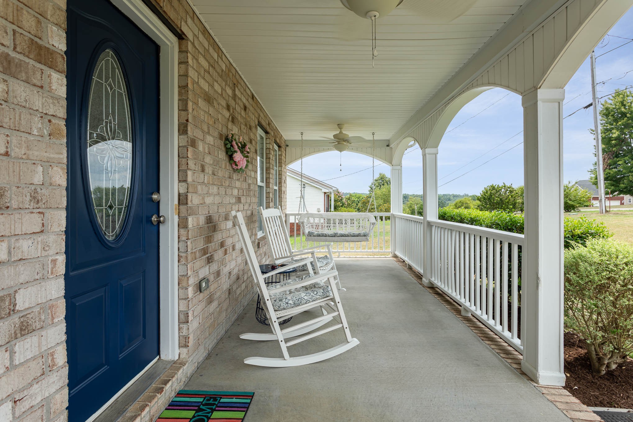 817 Blakemore Road Dickson, TN 37055 - Photo 4 of 30 a view of a porch with a table and chairs