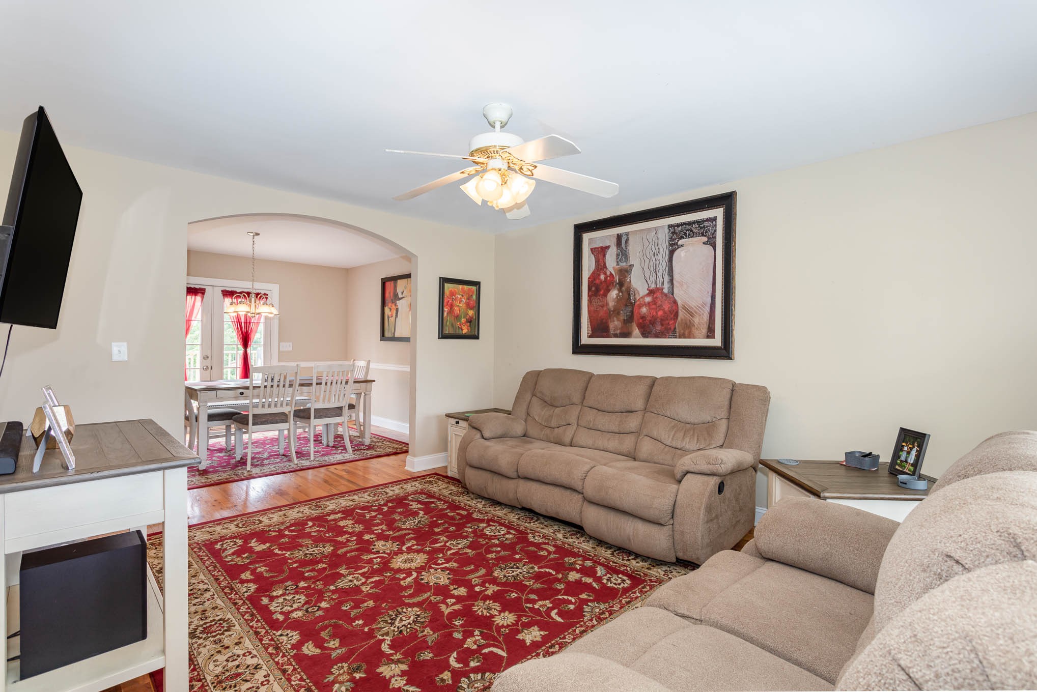 817 Blakemore Road Dickson, TN 37055 - Photo 5 of 30 a living room with furniture and a flat screen tv
