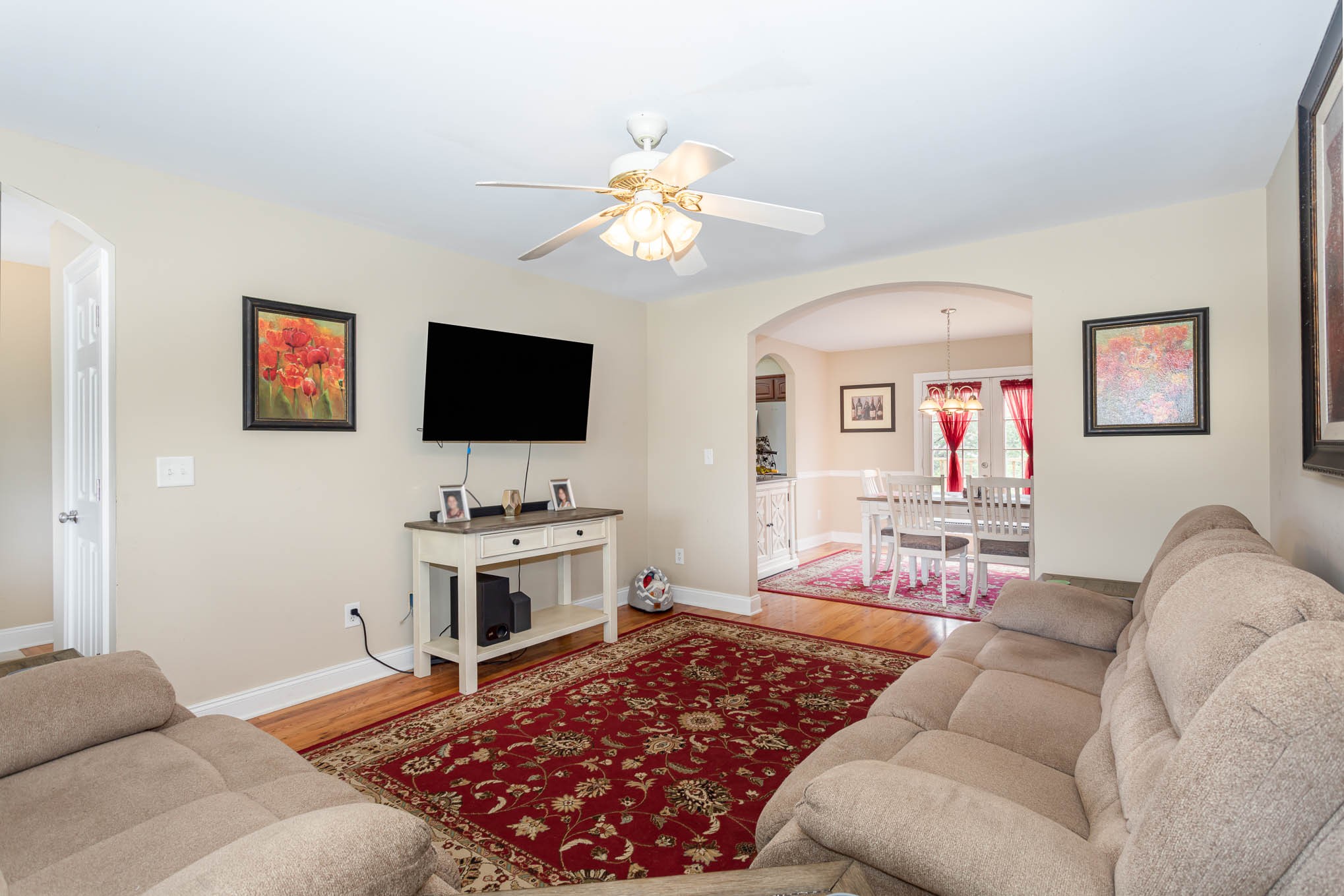 817 Blakemore Road Dickson, TN 37055 - Photo 6 of 30 a living room with furniture and a flat screen tv