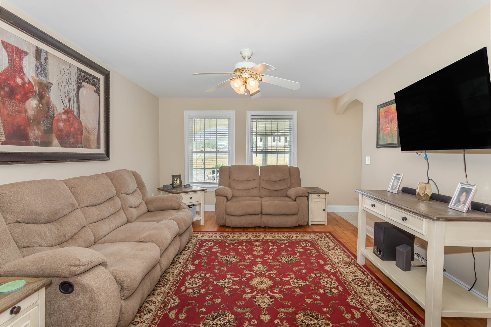 817 Blakemore Road Dickson, TN 37055 - Photo 7 of 30 a living room with furniture and a flat screen tv