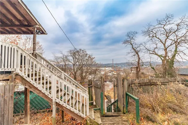 a view of pathway along with residential houses