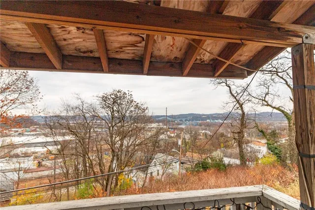 a view of a yard from a balcony