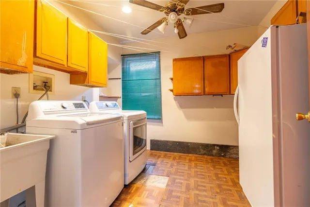 a utility room with dryer and washer