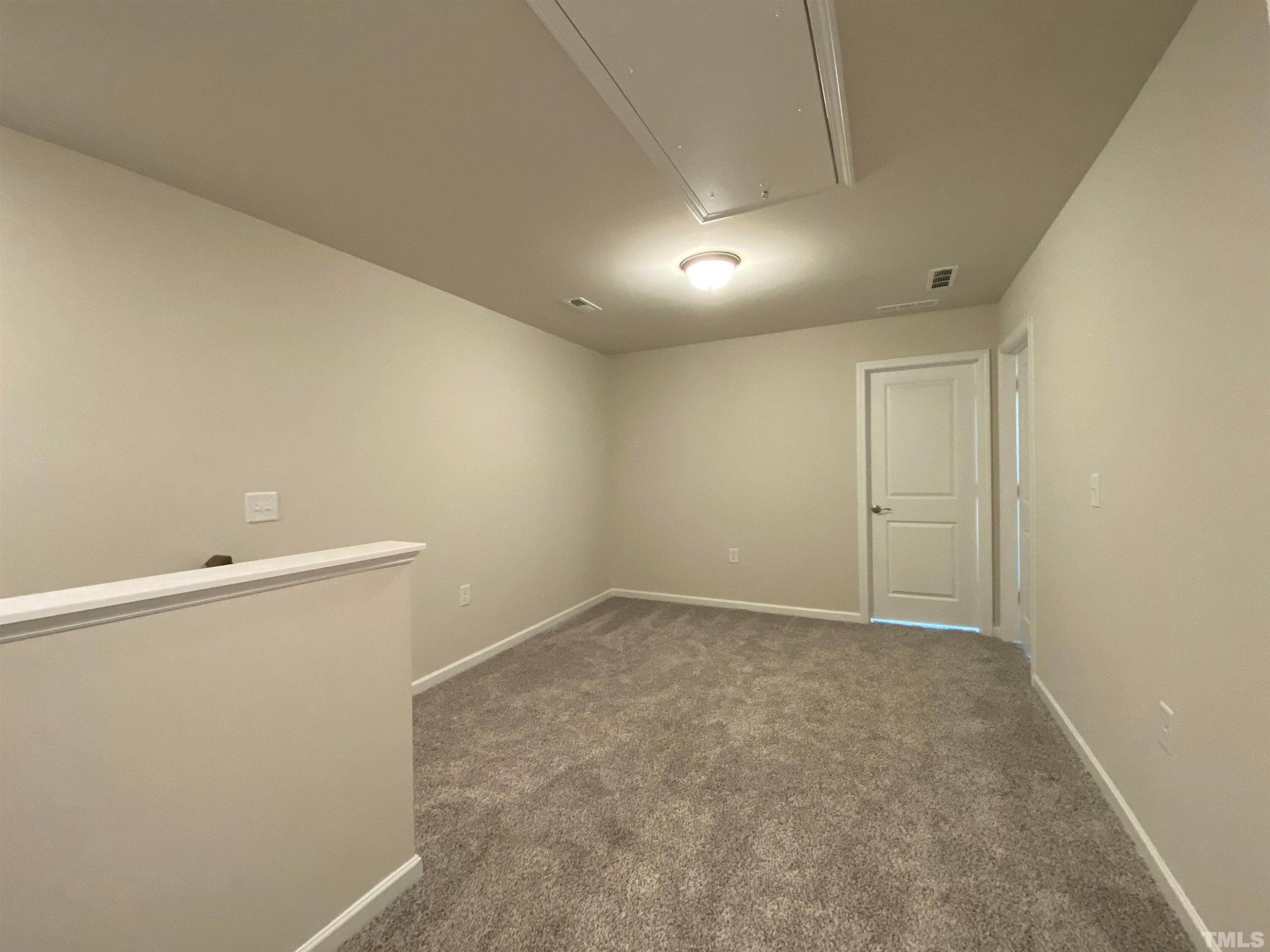 908 Clearhaven Lane Fuquay-Varina, NC 27526 - Photo 20 of 23 a view of an empty room
