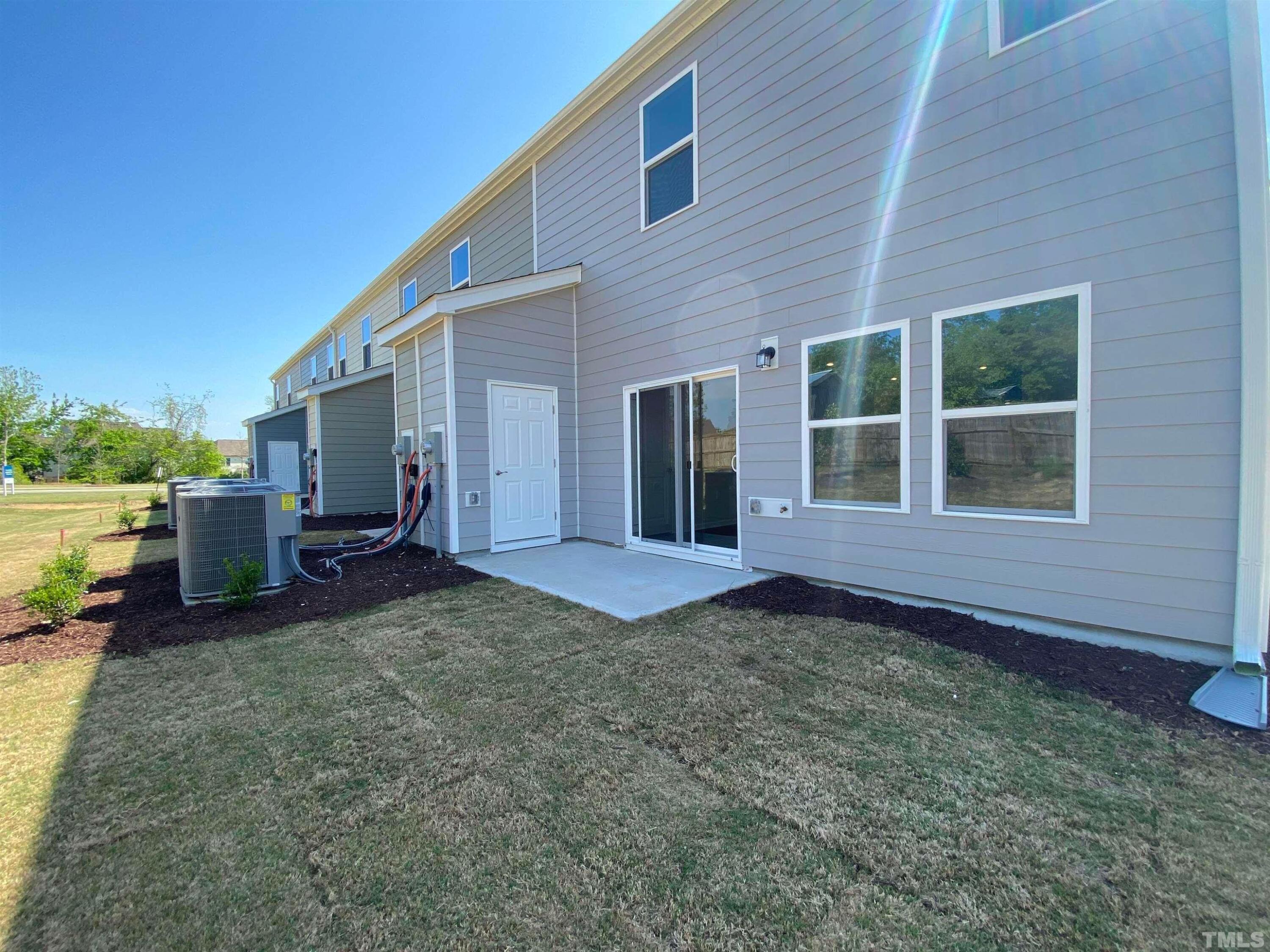 908 Clearhaven Lane Fuquay-Varina, NC 27526 - Photo 7 of 23 a view of a house with backyard and porch