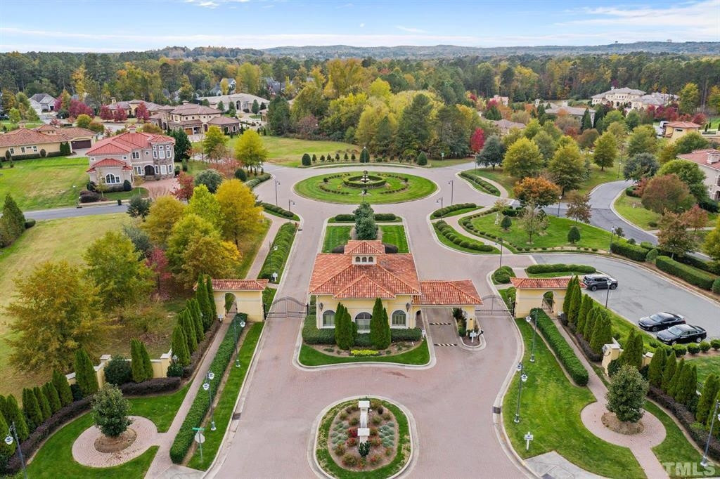 31 Treviso Place Durham, NC 27707 - Photo 16 of 21 an aerial view of a house with garden space and lake view