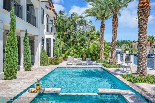 a view of a backyard with a patio