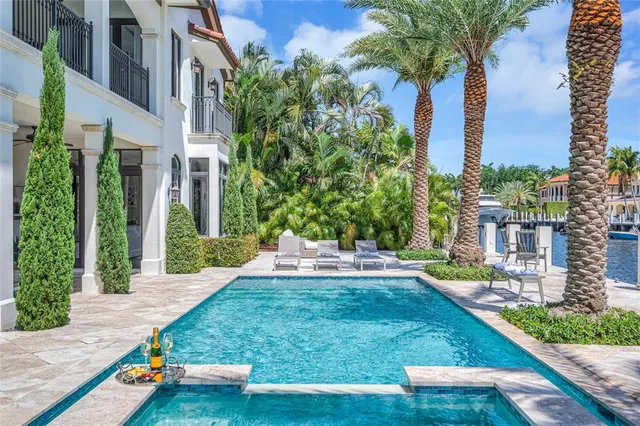 a view of a backyard with a patio