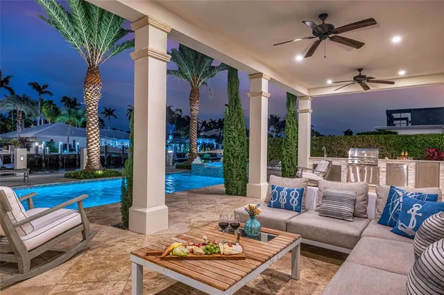 a outdoor living space with furniture and a potted plant