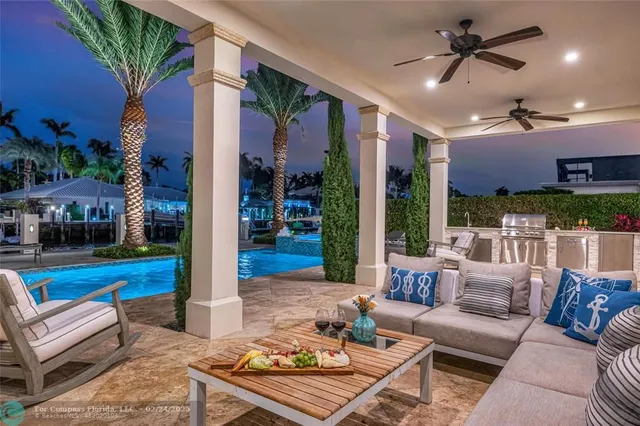 a outdoor living space with furniture and a potted plant