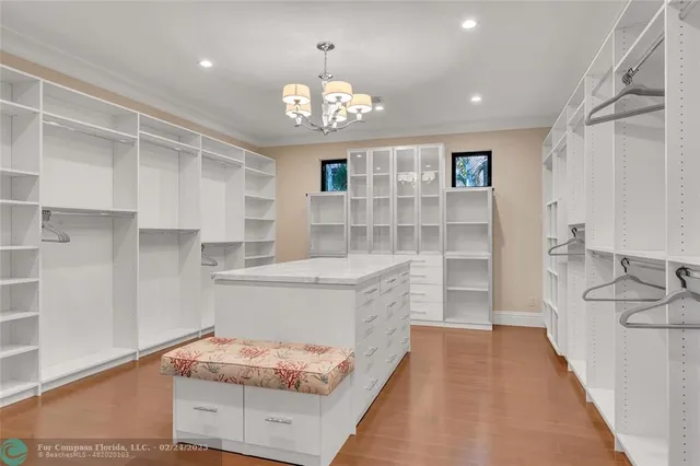 a kitchen with cabinets and window