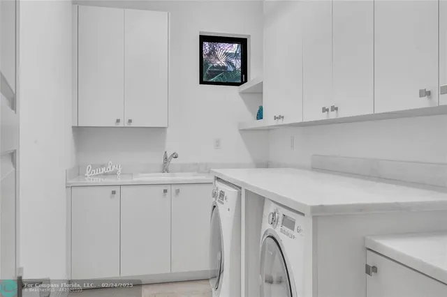 a view of cabinets with wooden floor
