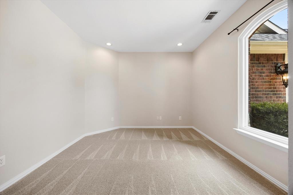 645 Channel Ridge Drive Rockwall, TX 75087 - Photo 8 of 40 This flexible space would make a perfect home office, sitting or play room.
