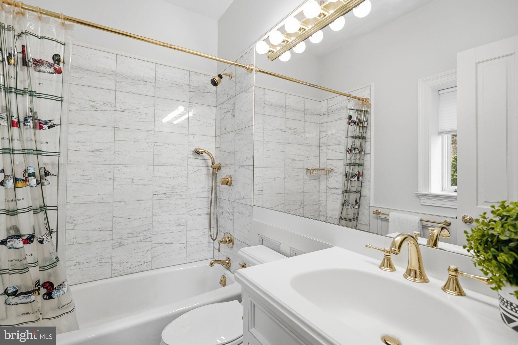 2318 Nebraska Avenue Northwest Washington, DC 20016 - Photo 24 of 28 a bathroom with a sink shower bathtub and a toilet