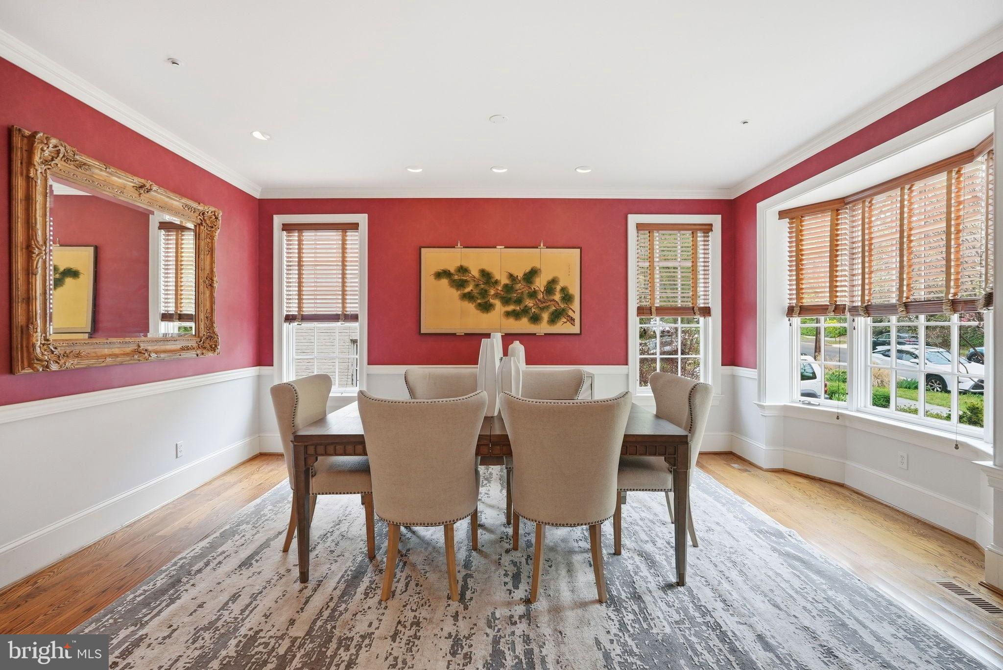 2318 Nebraska Avenue Northwest Washington, DC 20016 - Photo 4 of 28 a view of a dining room with furniture a chandelier and wooden floor