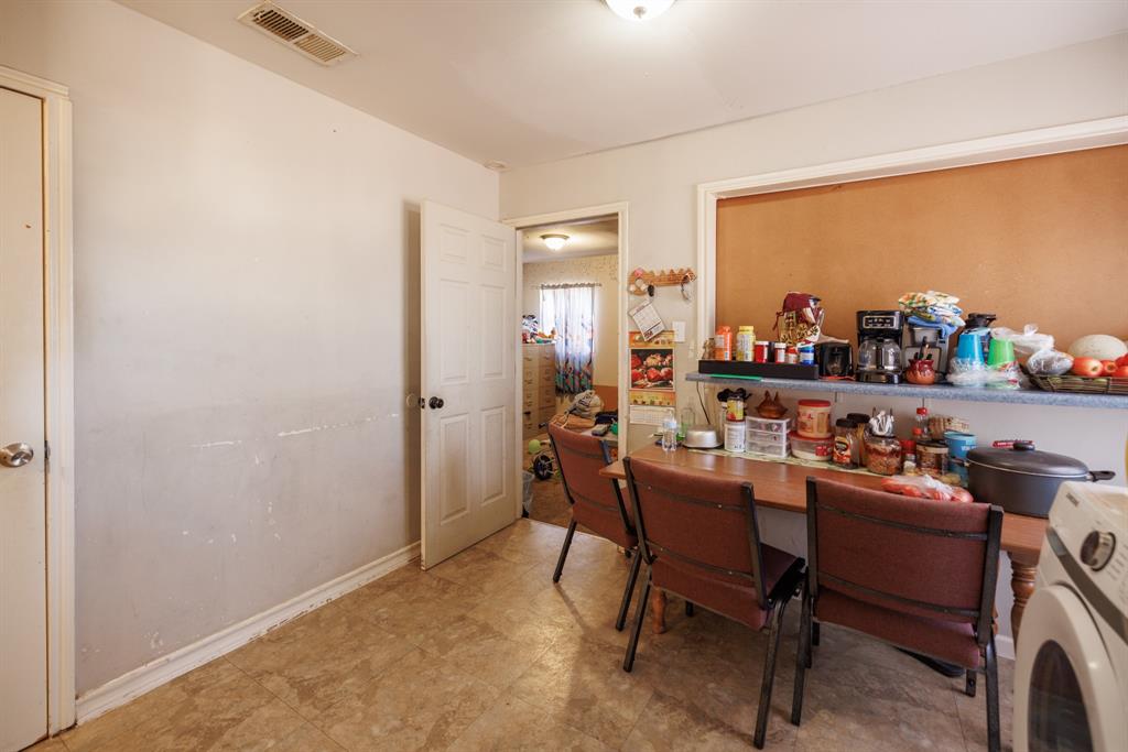 5349 Encino Road Abilene, TX 79605 - Photo 12 of 21 a dining room with furniture and a floor to ceiling window