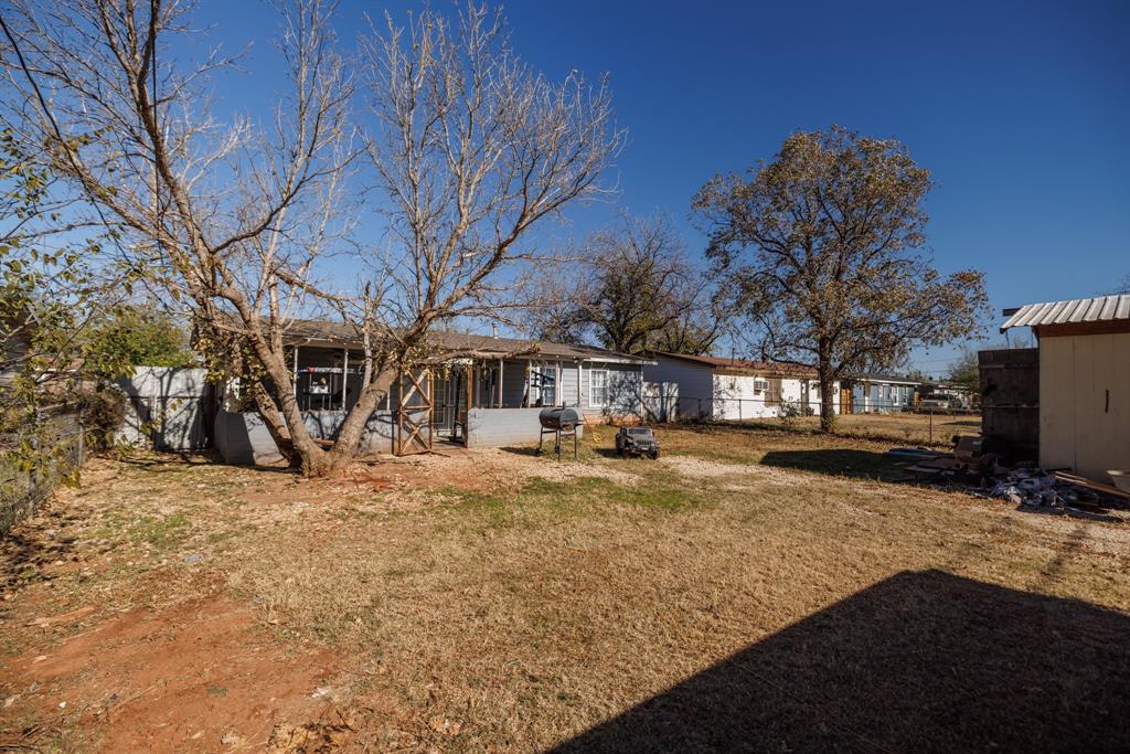 5349 Encino Road Abilene, TX 79605 - Photo 20 of 21 a view of a yard with large trees