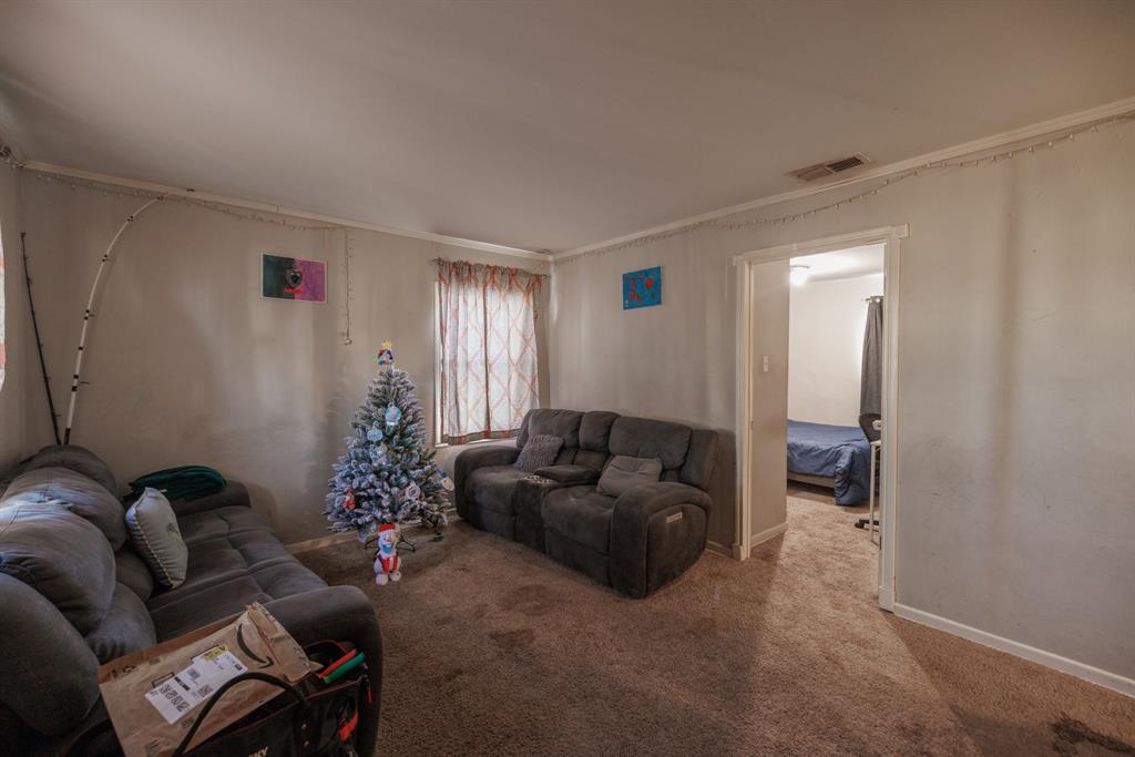 5349 Encino Road Abilene, TX 79605 - Photo 2 of 21 a living room with furniture and a window