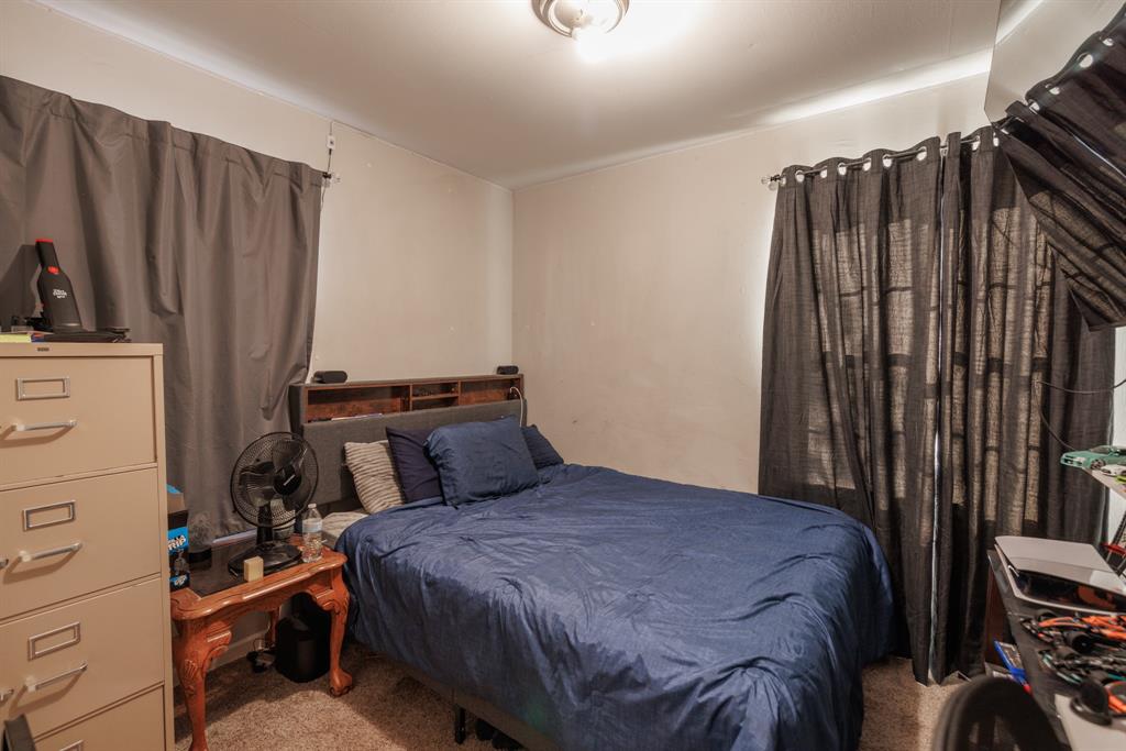 5349 Encino Road Abilene, TX 79605 - Photo 4 of 21 a bedroom with a bed and a closet