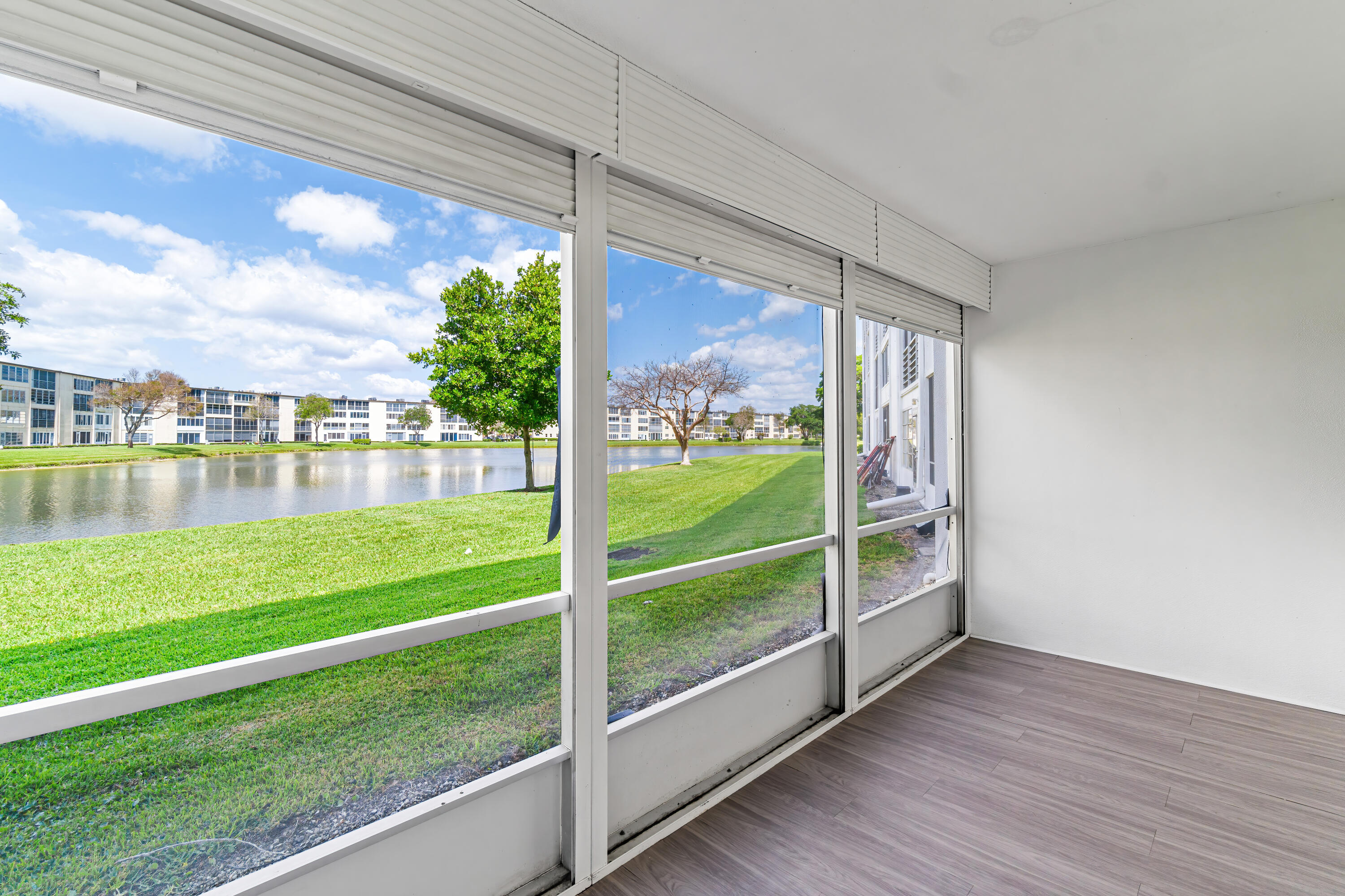 1007 Rexford Drive, Unit 1007 Boca Raton, FL 33434 - Photo 14 of 21 a view of a garden with an outdoor space
