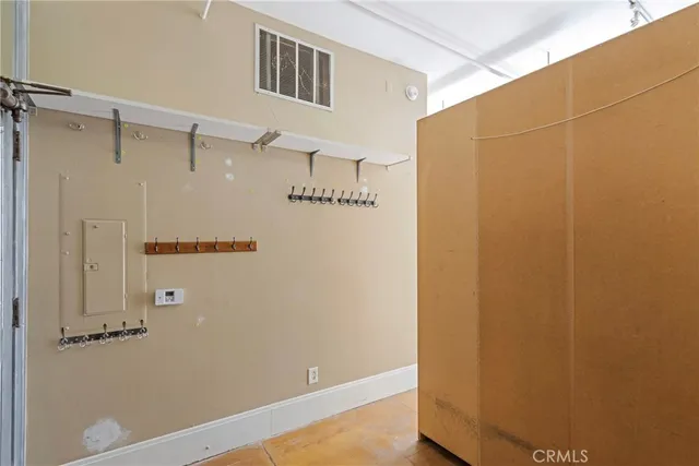 a view of a building with a glass door