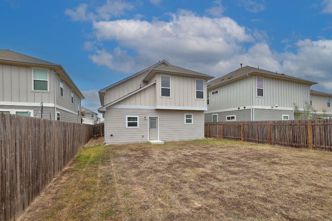 10709 Blacket Drive Austin, TX 78747 - Photo 24 of 27 a view of a house with a yard