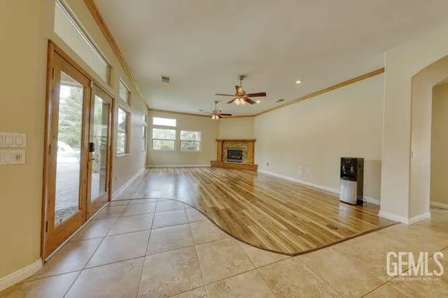 a view of an entryway with wooden floor