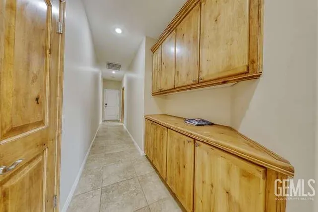 a view of a hallway with elevator