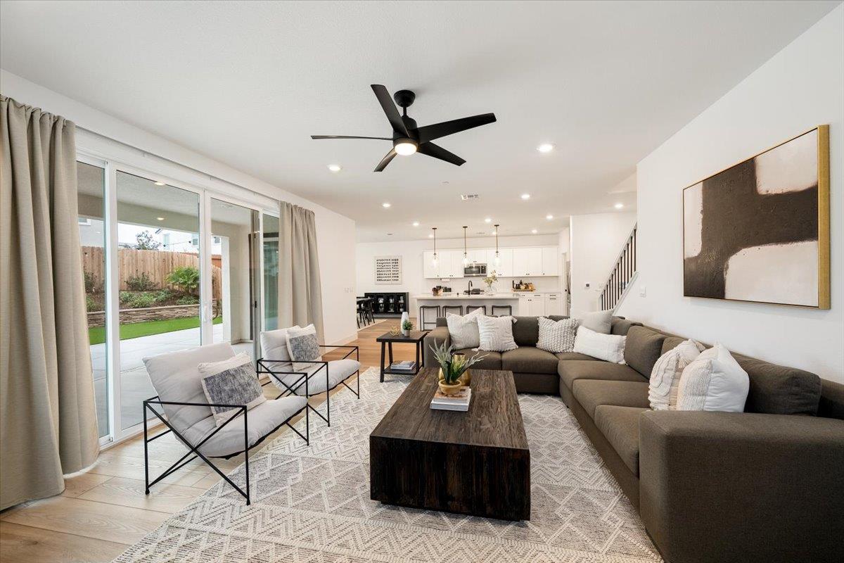 280 Vectra Court Roseville, CA 95747 - Photo 12 of 84 a living room with furniture kitchen view and a large window