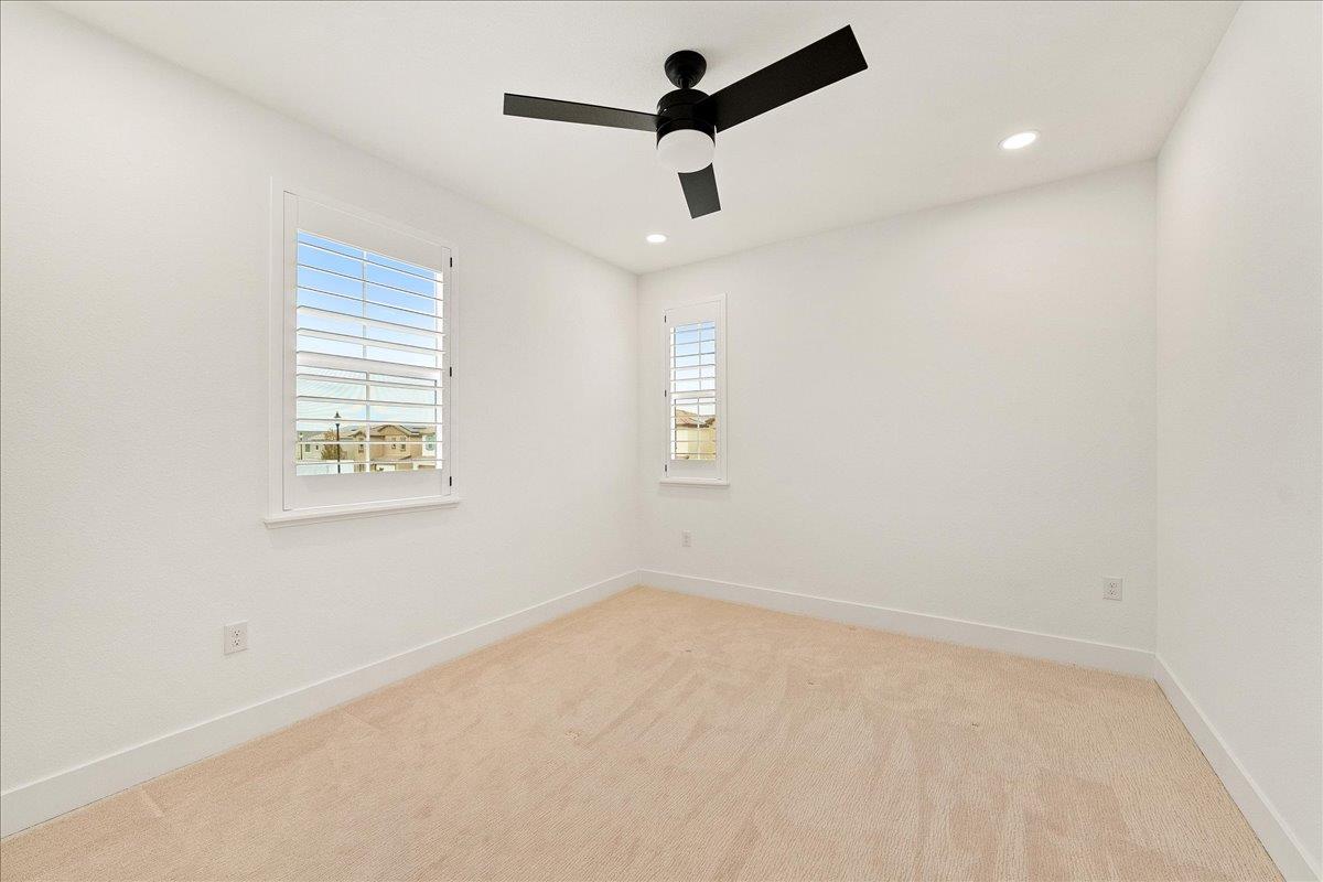 280 Vectra Court Roseville, CA 95747 - Photo 60 of 84 an empty room with a window and a fan