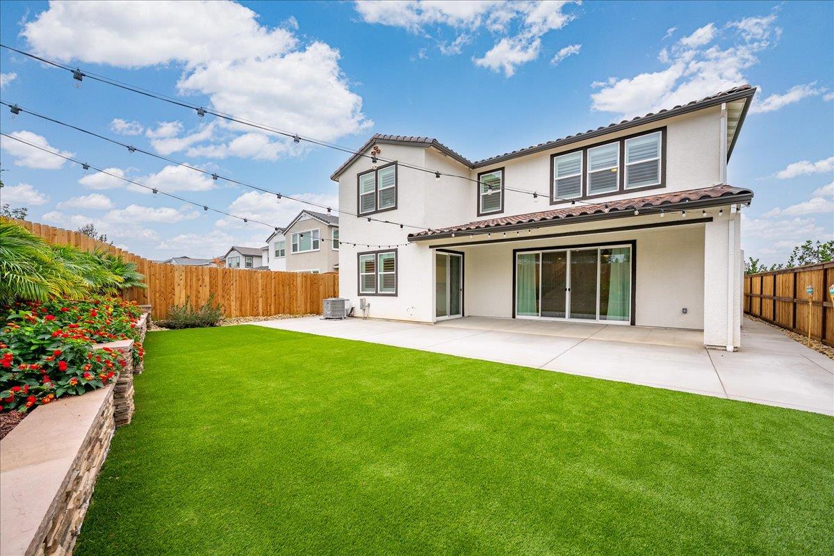 280 Vectra Court Roseville, CA 95747 - Photo 77 of 84 a front view of a house with a garden and yard