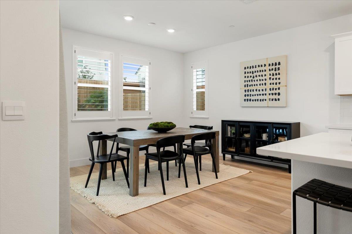 280 Vectra Court Roseville, CA 95747 - Photo 8 of 84 a view of a a dining room with furniture window and wooden floor