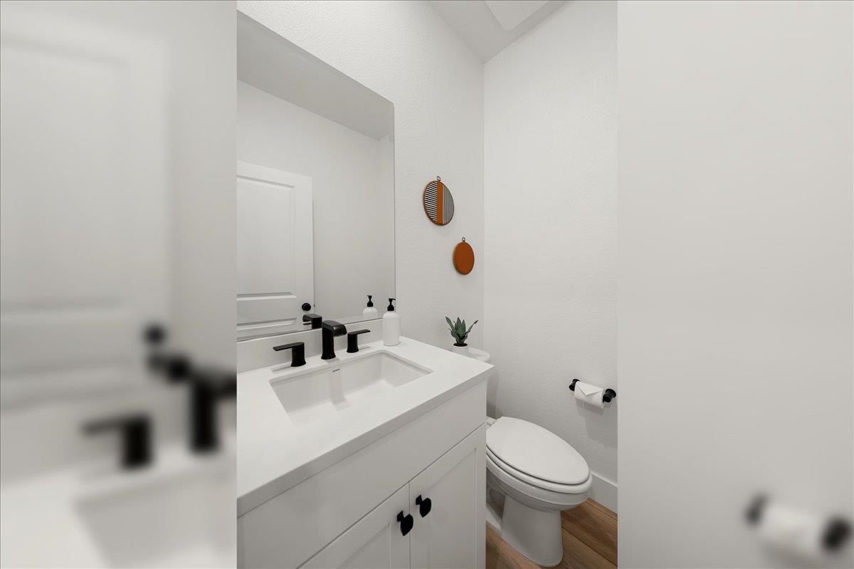 280 Vectra Court Roseville, CA 95747 - Photo 81 of 84 a bathroom with a sink mirror vanity and toilet