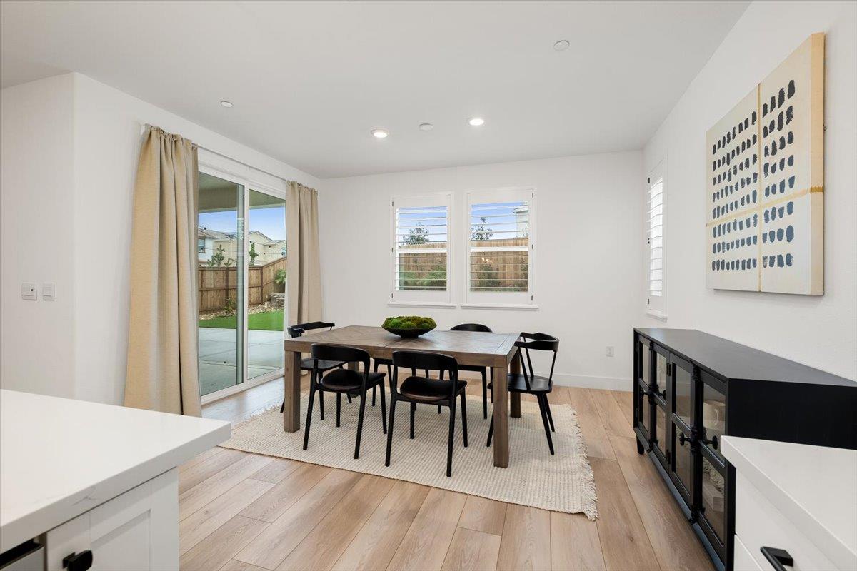 280 Vectra Court Roseville, CA 95747 - Photo 82 of 84 a view of a dining room with furniture and wooden floor