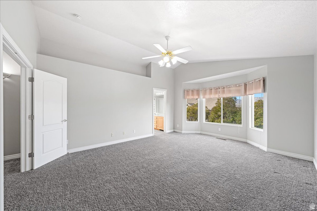 7 Reflection Way St. George, UT 84770 - Photo 41 of 54 Carpeted empty room featuring lofted ceiling and ceiling fan