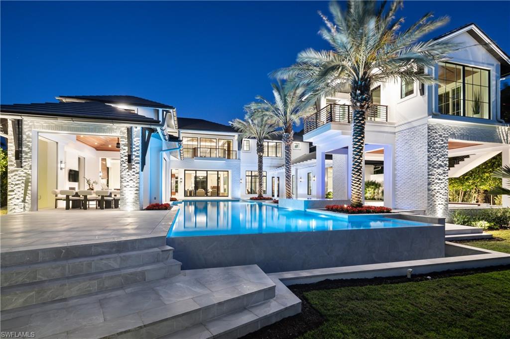 a view of outdoor space yard deck and swimming pool