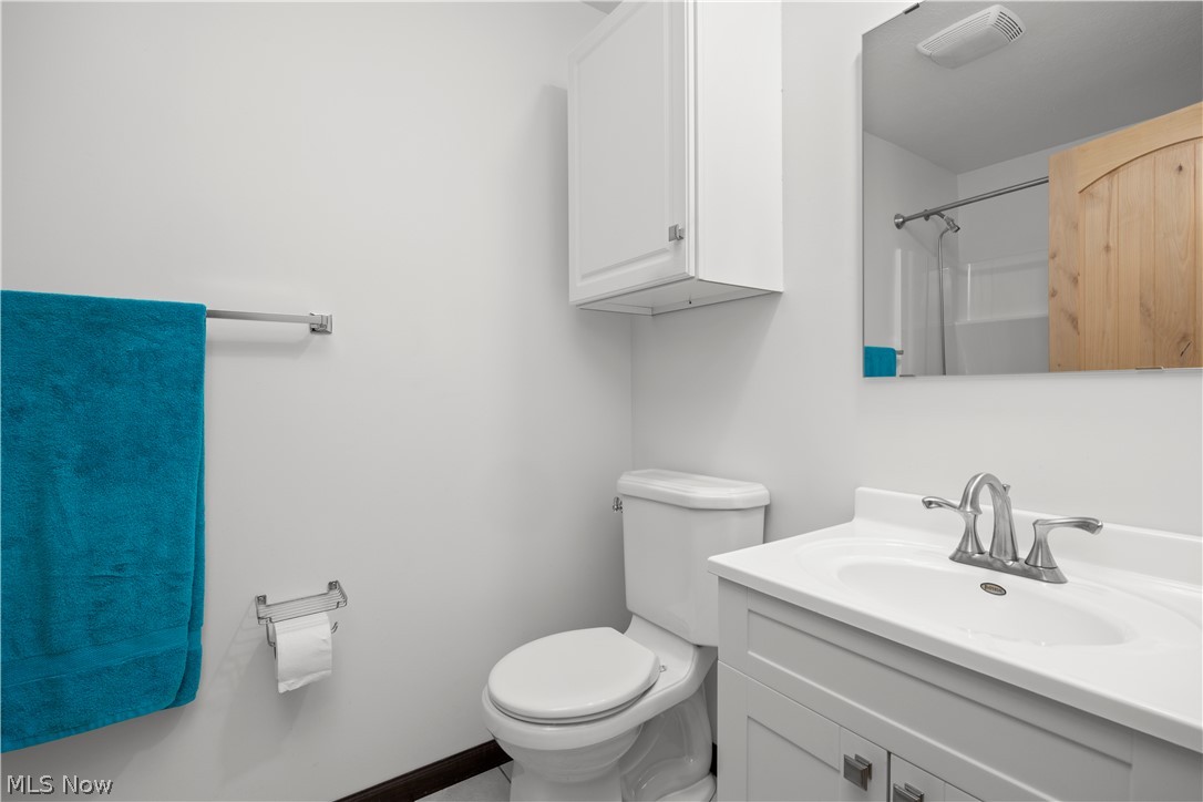 6760 Mason Road Berlin Heights, OH 44814 - Photo 24 of 49 Full bath with vanity and a shower