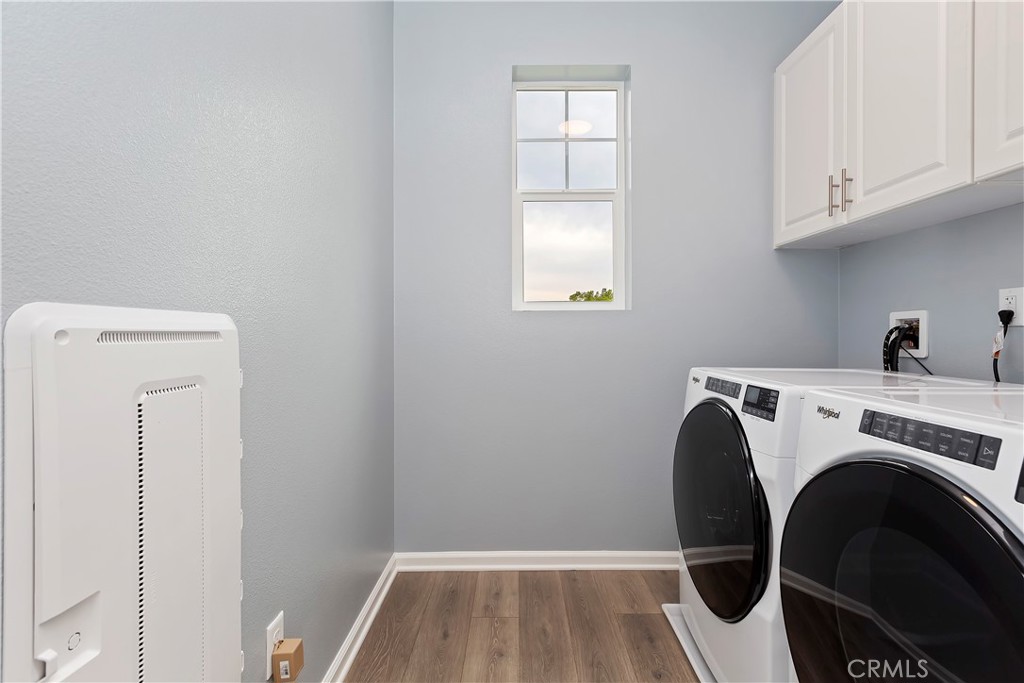 7179 Rindle Lane Riverside, CA 92503 - Photo 14 of 21 a utility room with dryer and washer