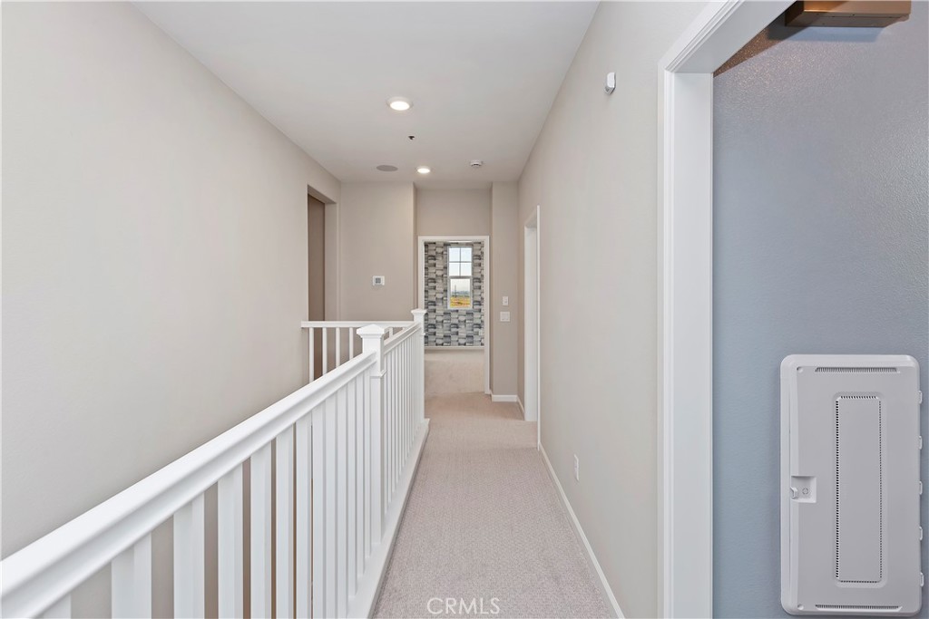 7179 Rindle Lane Riverside, CA 92503 - Photo 15 of 21 a view of a hallway with closet