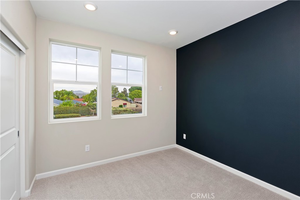 7179 Rindle Lane Riverside, CA 92503 - Photo 16 of 21 an empty room with windows