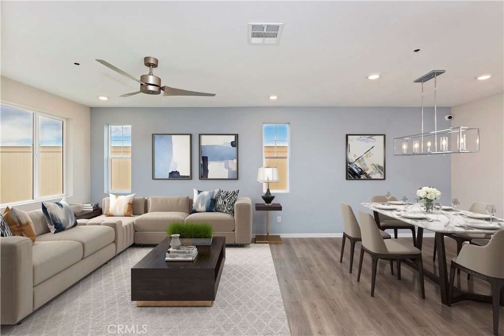 7179 Rindle Lane Riverside, CA 92503 - Photo 2 of 21 a living room with furniture and a large window